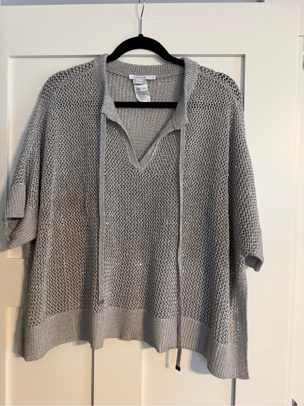 Chico’s Silver Open-Knit V-Neck Sweater/ poncho w/sleeves. Size is S/M runs big.